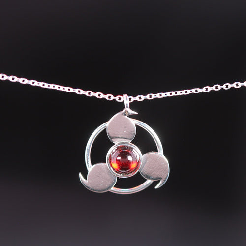 Sterling silver awakened eye necklace with garnet