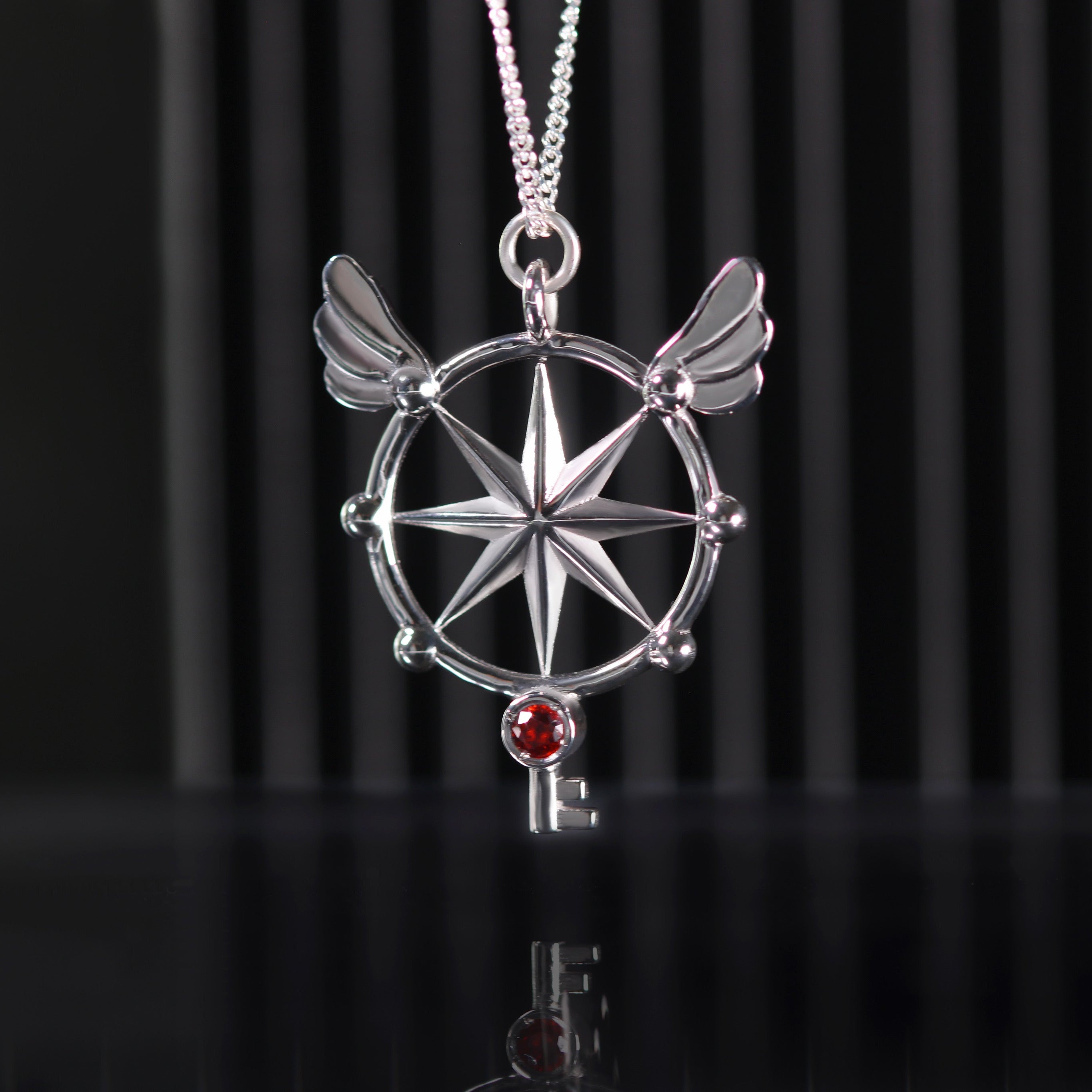 Sterling silver crystal key necklace with rhodolite garnet