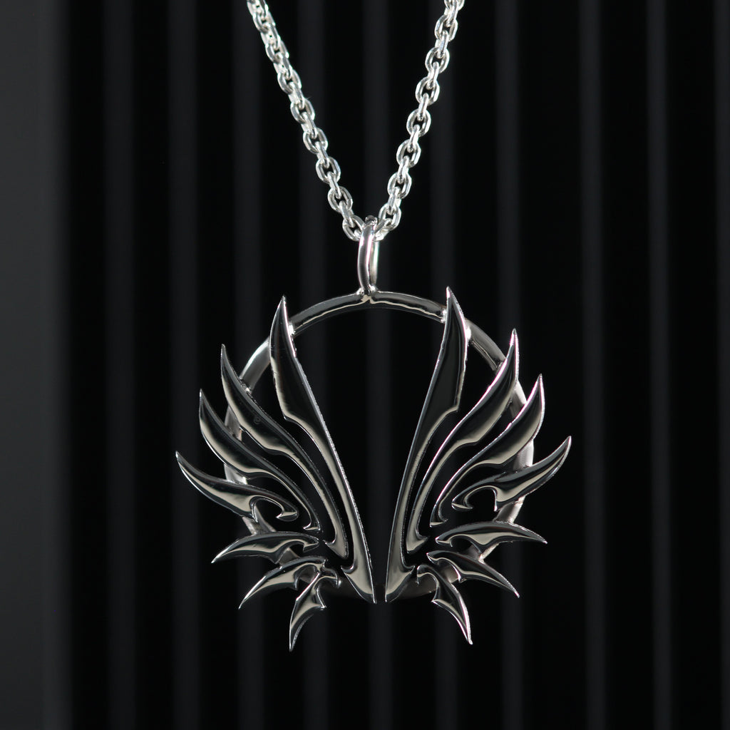 Sterling silver wing necklace with delicate open wings
