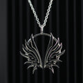 Sterling silver wing necklace with delicate open wings