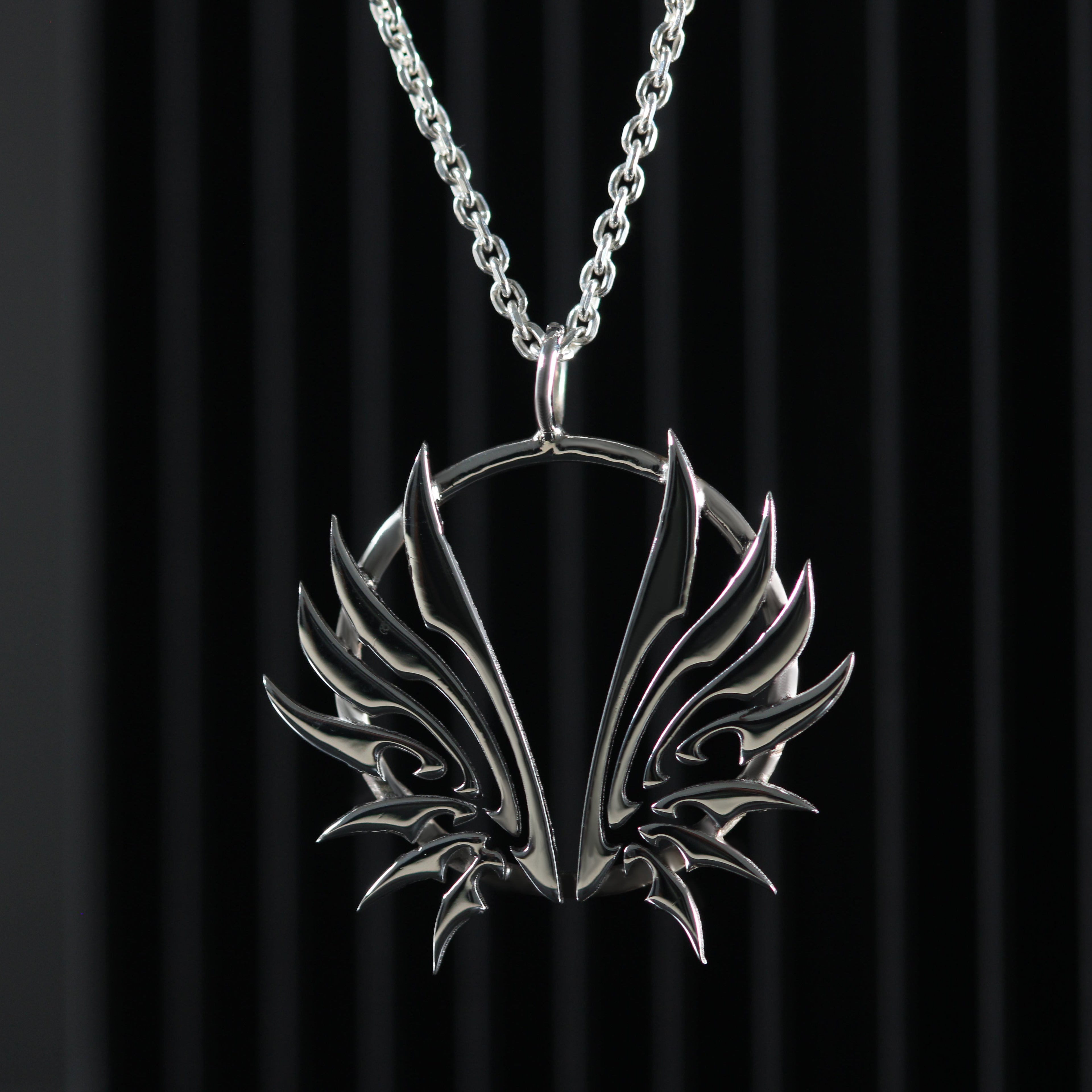 Sterling silver wing necklace with delicate open wings