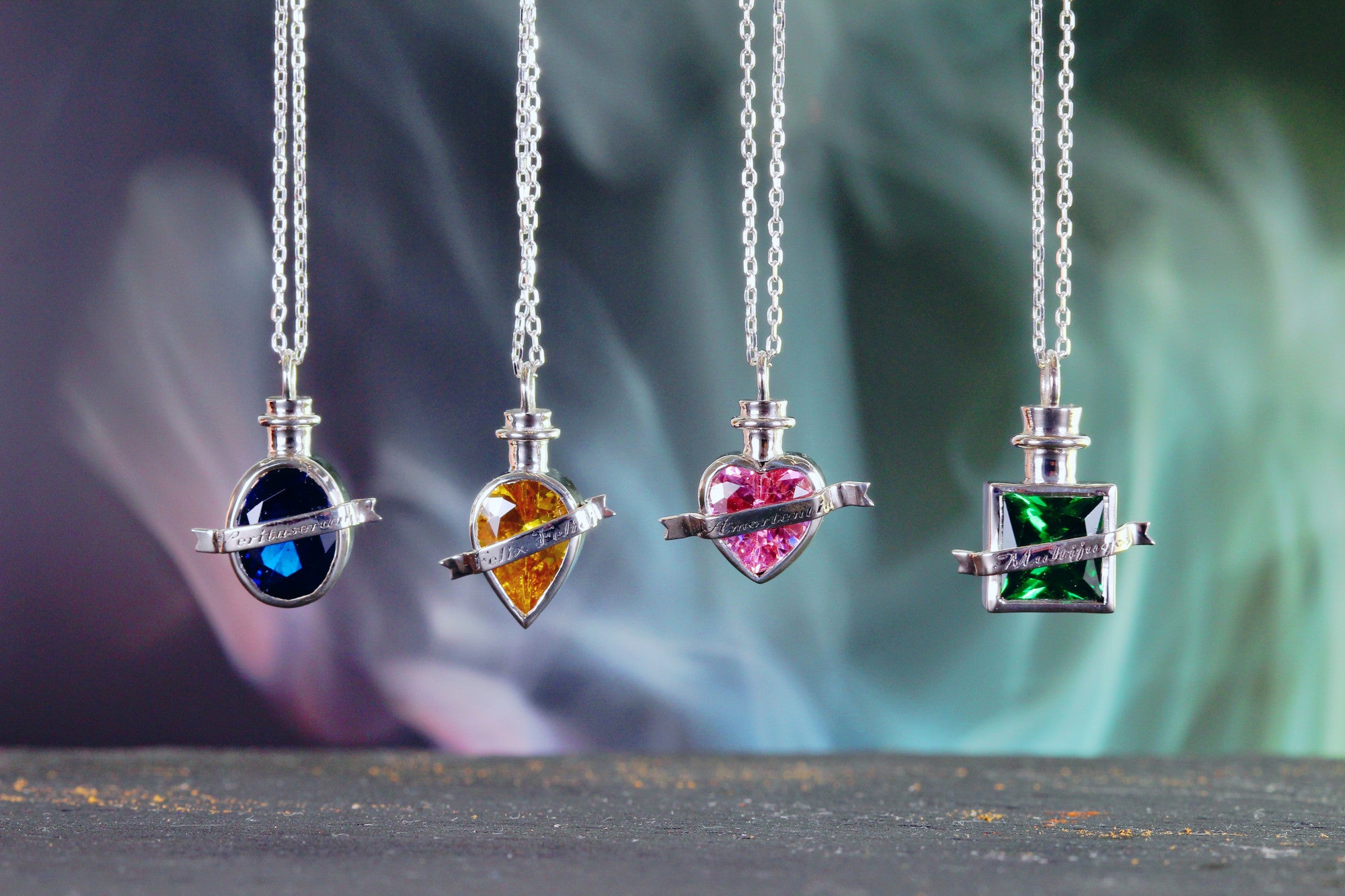 Set of four elixir necklaces in sterling silver