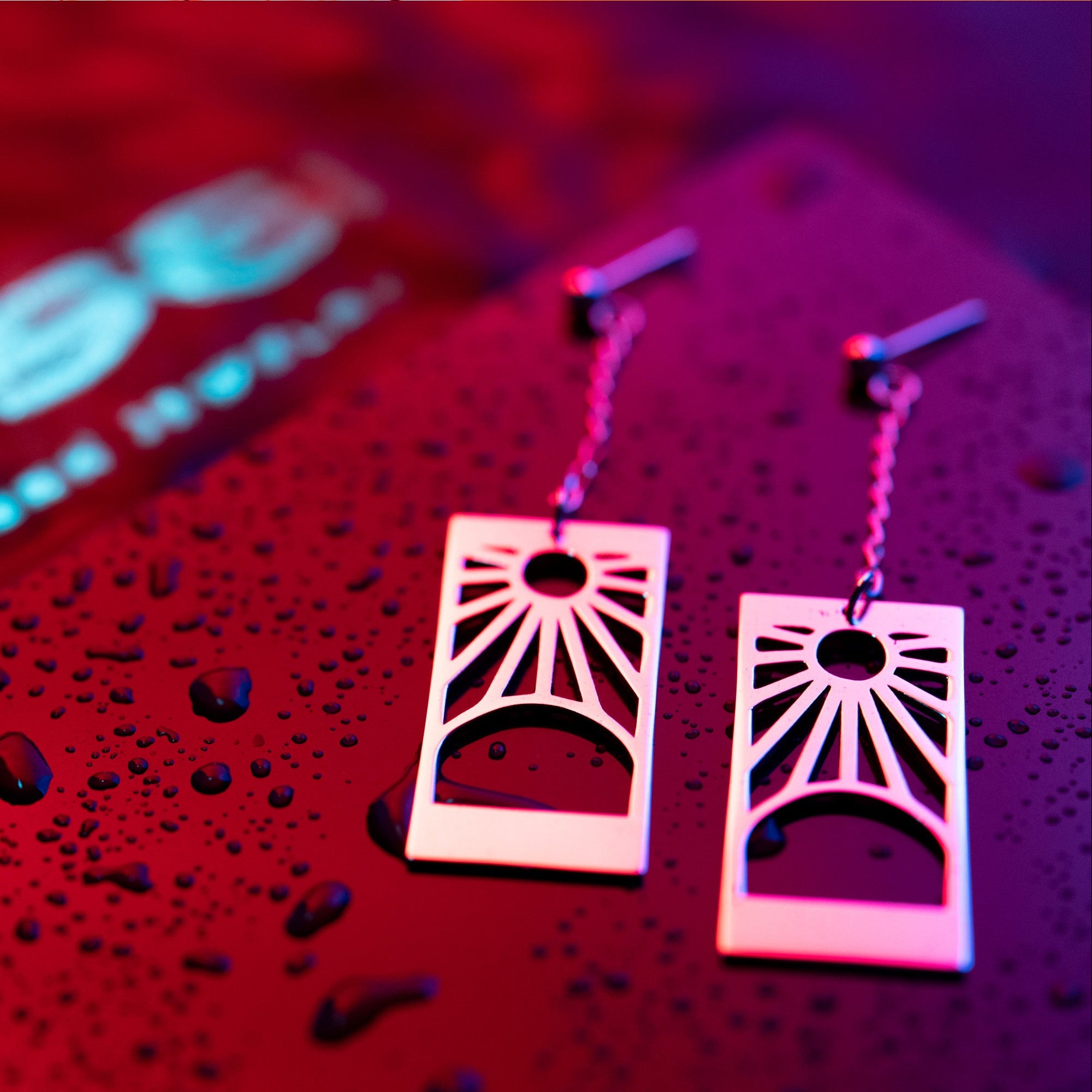 Hanafuda earrings worn, showing movement and elegant long design
