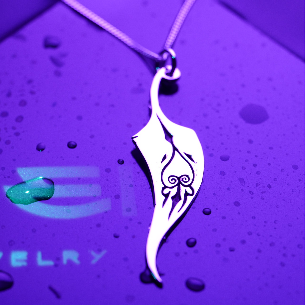 Detail of engraved symbol on feather necklace