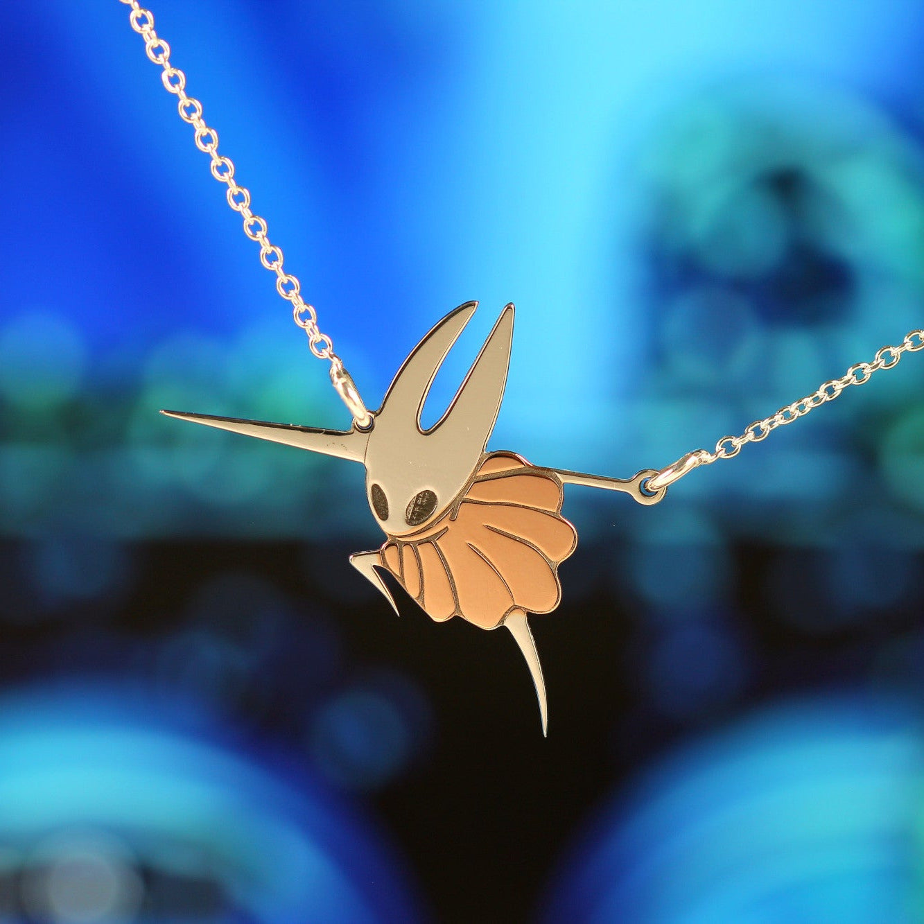 Detail of silhouette pendant and chain