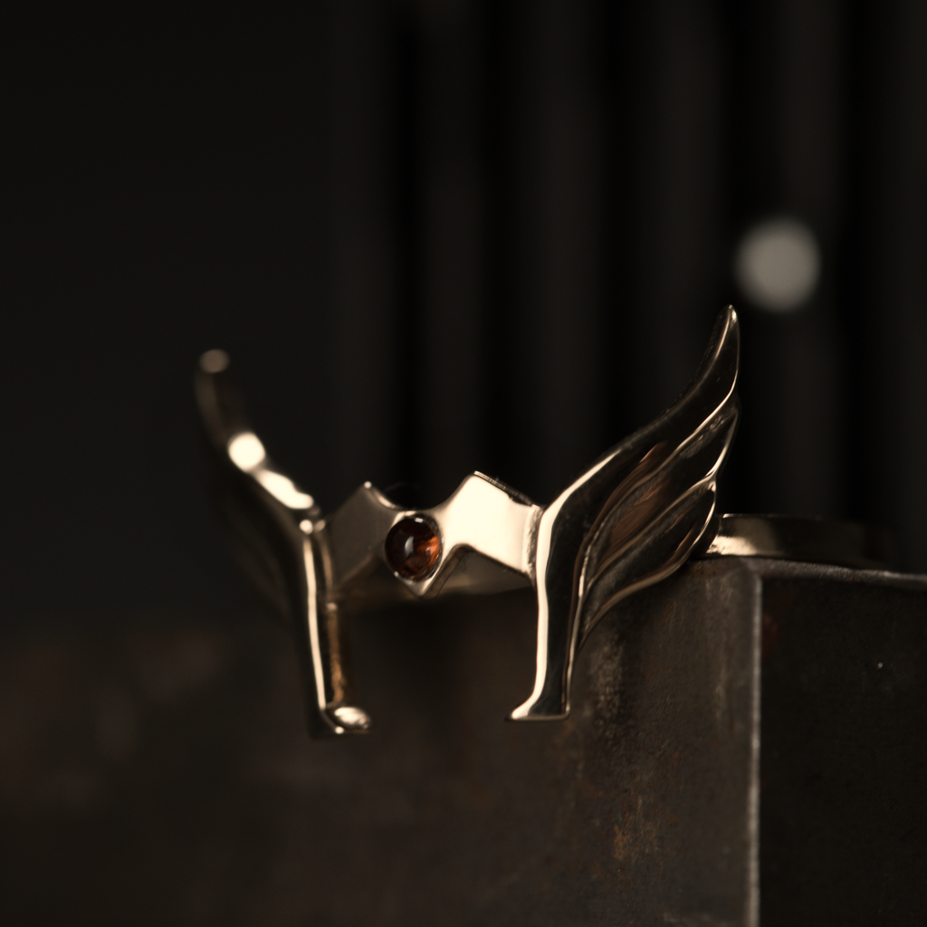 Helmet ring worn, showing bold and regal design