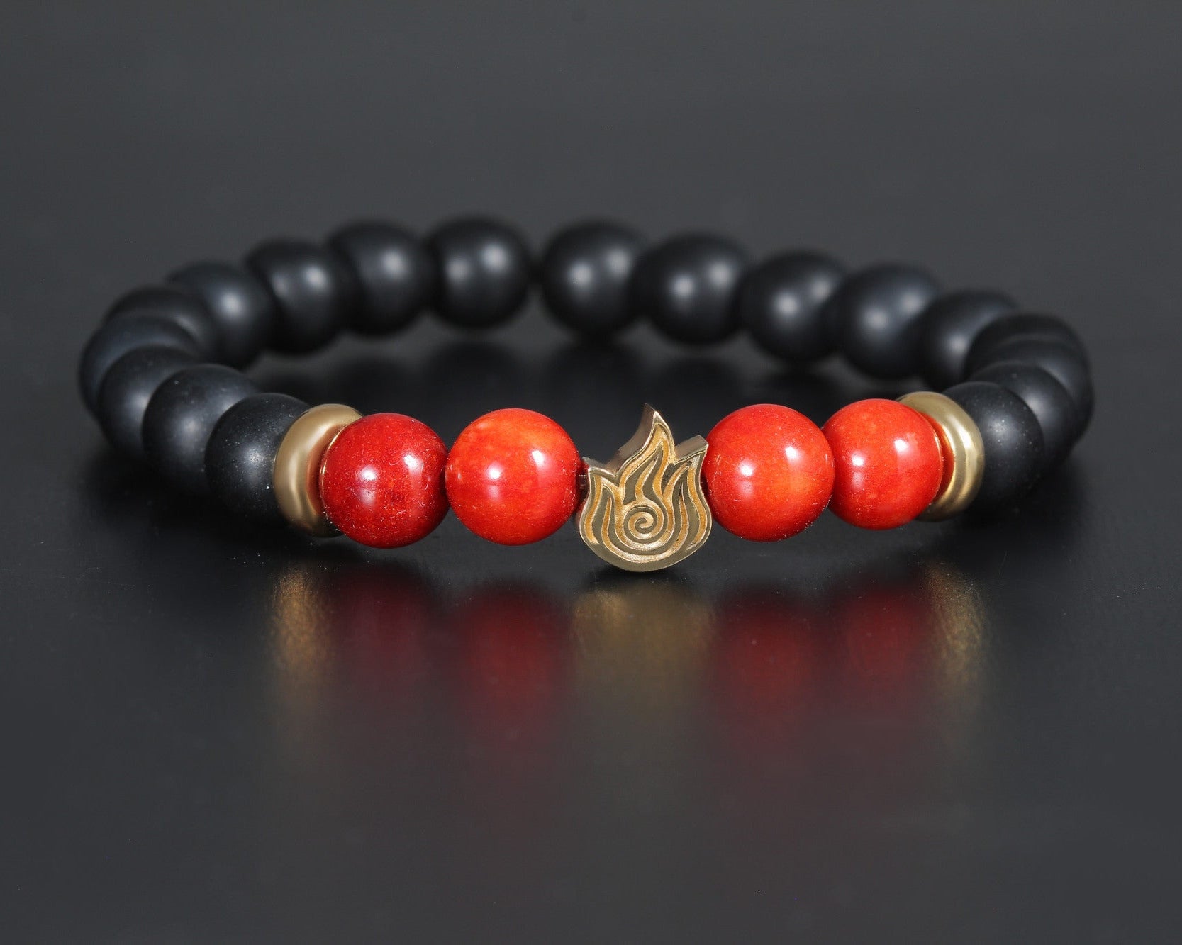 Hi bracelet in sterling silver with gold plated fire symbol, black onyx and red agate beads