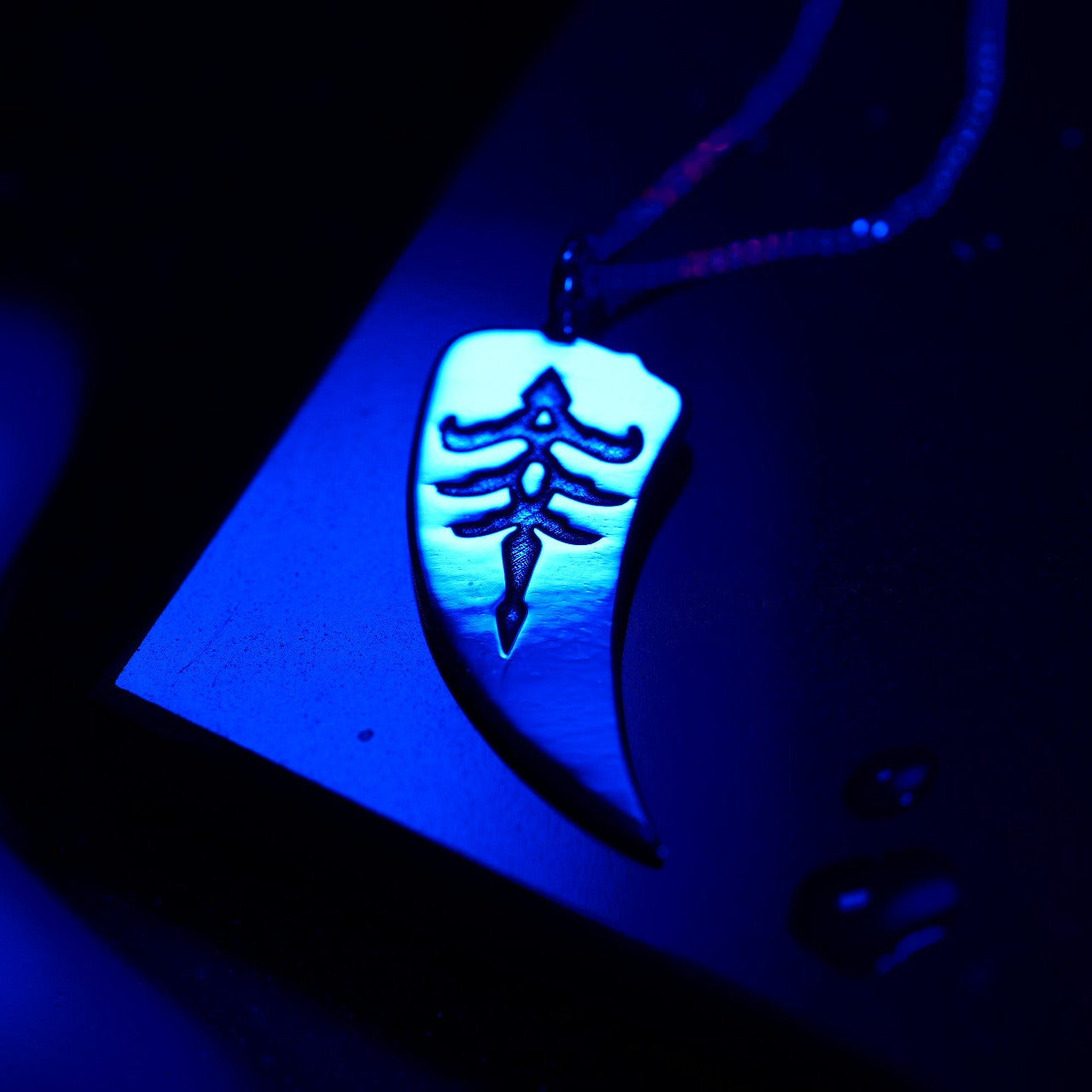 Full view of hunter sigil necklace