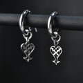 Kage hoop earrings in sterling silver with inverted heart symbol representing darkness
