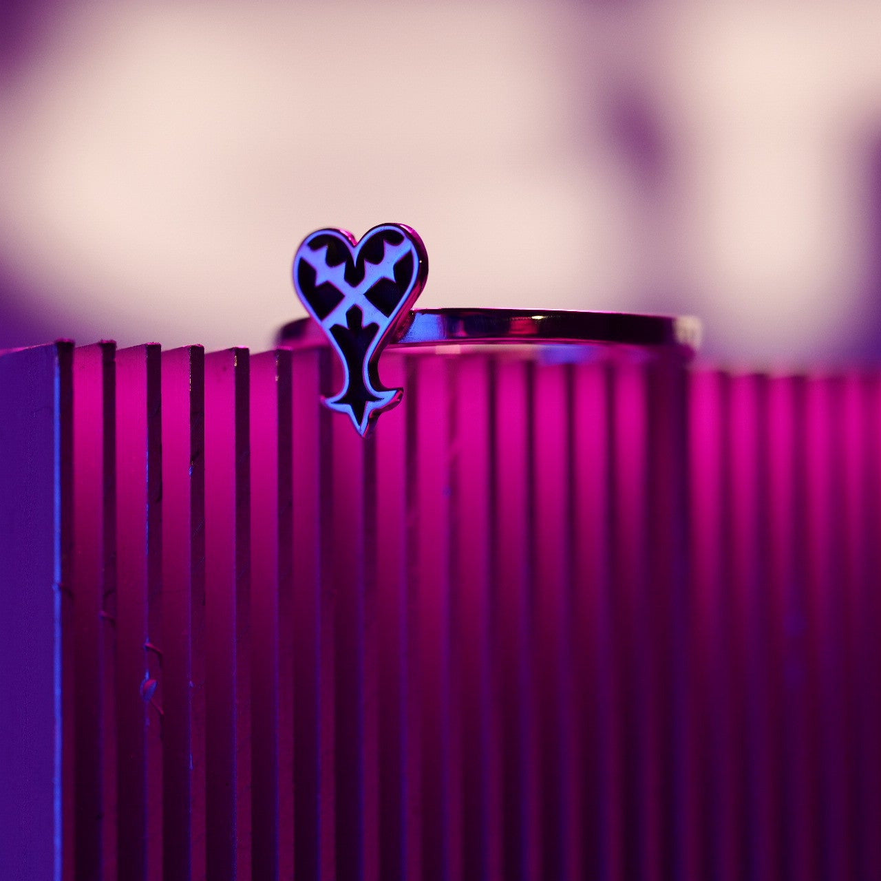 Kage ring worn, showing bold and symbolic design