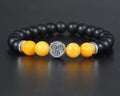 Kaze bracelet in sterling silver with air symbol, black onyx and yellow agate beads