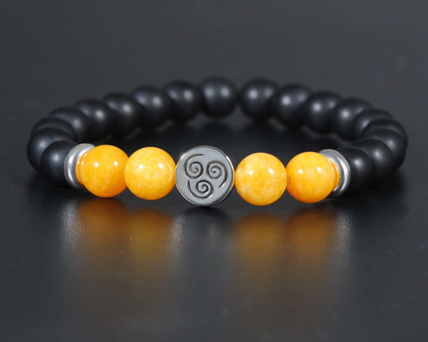 Kaze bracelet in sterling silver with air symbol, black onyx and yellow agate beads