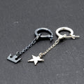 Kizuna earrings in sterling silver with crown and star charms representing memory and promise