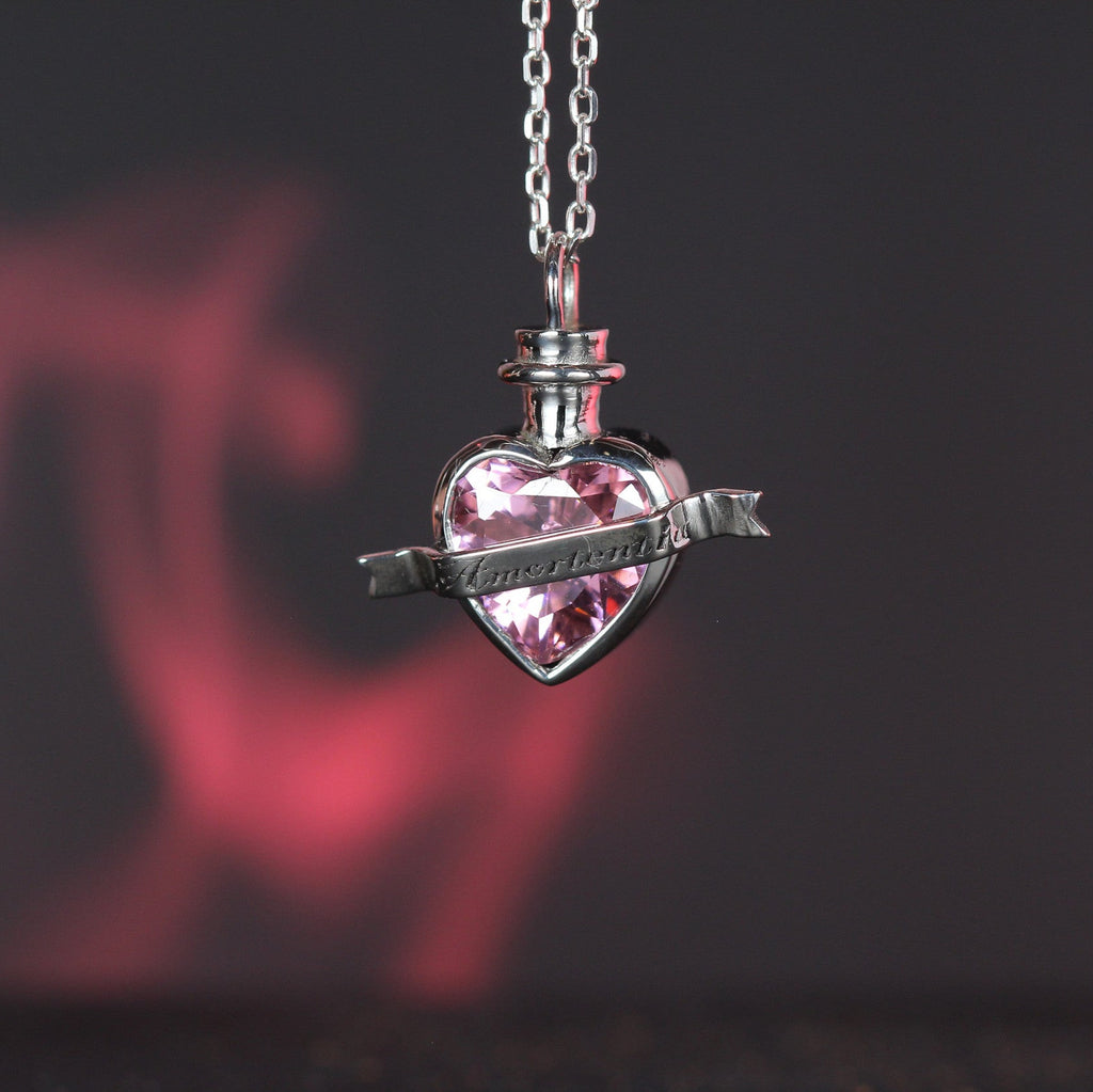 Detailed view of potion necklace and chain
