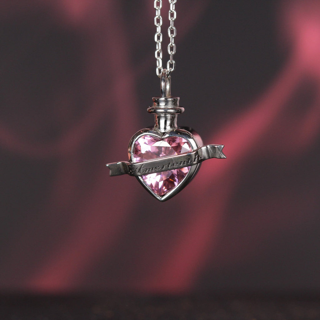 Full view of love elixir necklace in sterling silver