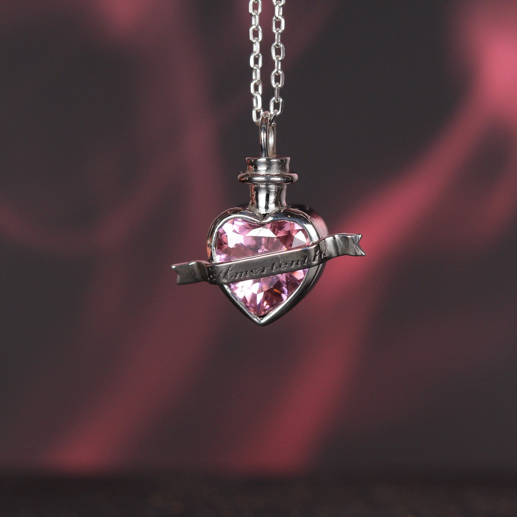 Full view of love elixir necklace in sterling silver