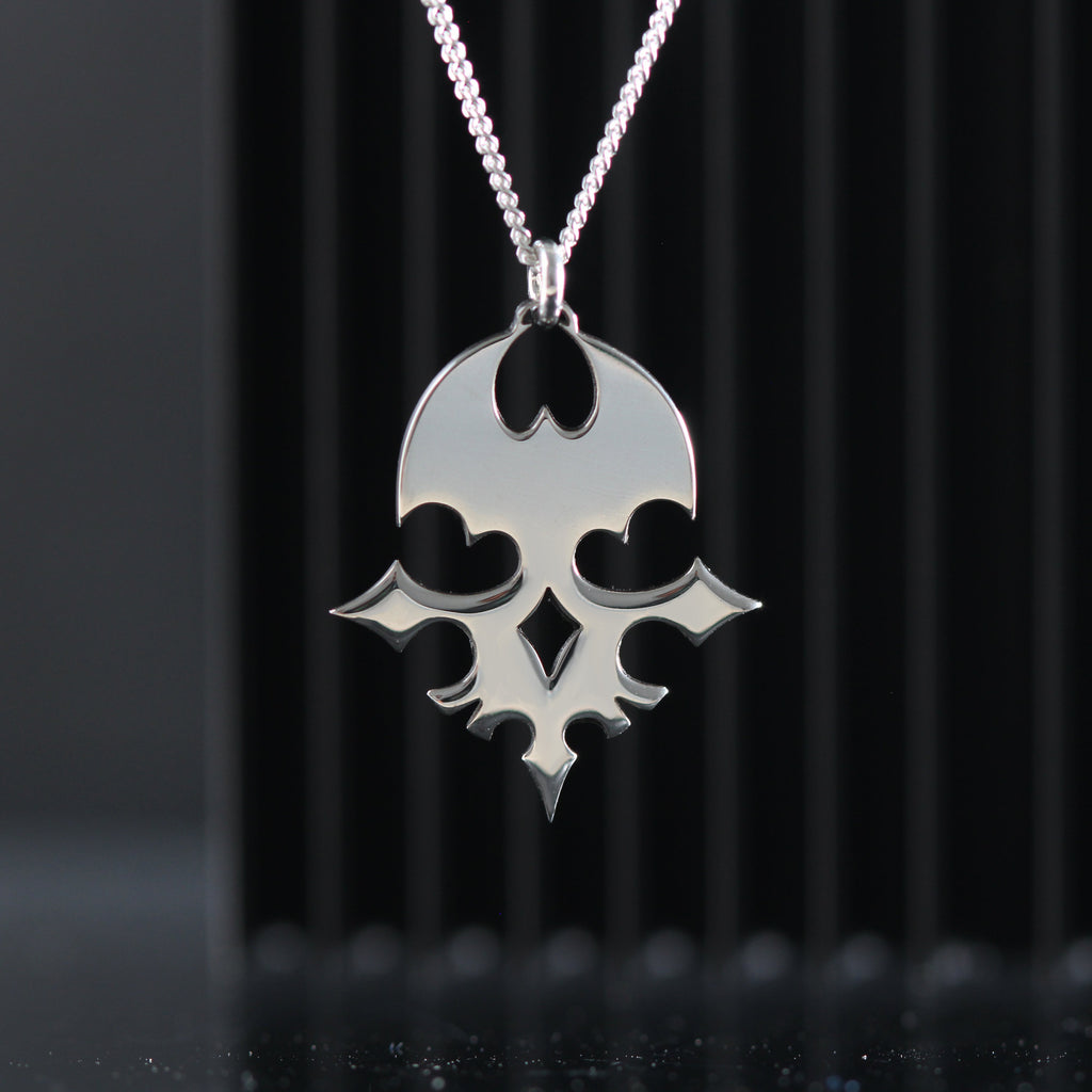 Sterling silver player emblem necklace