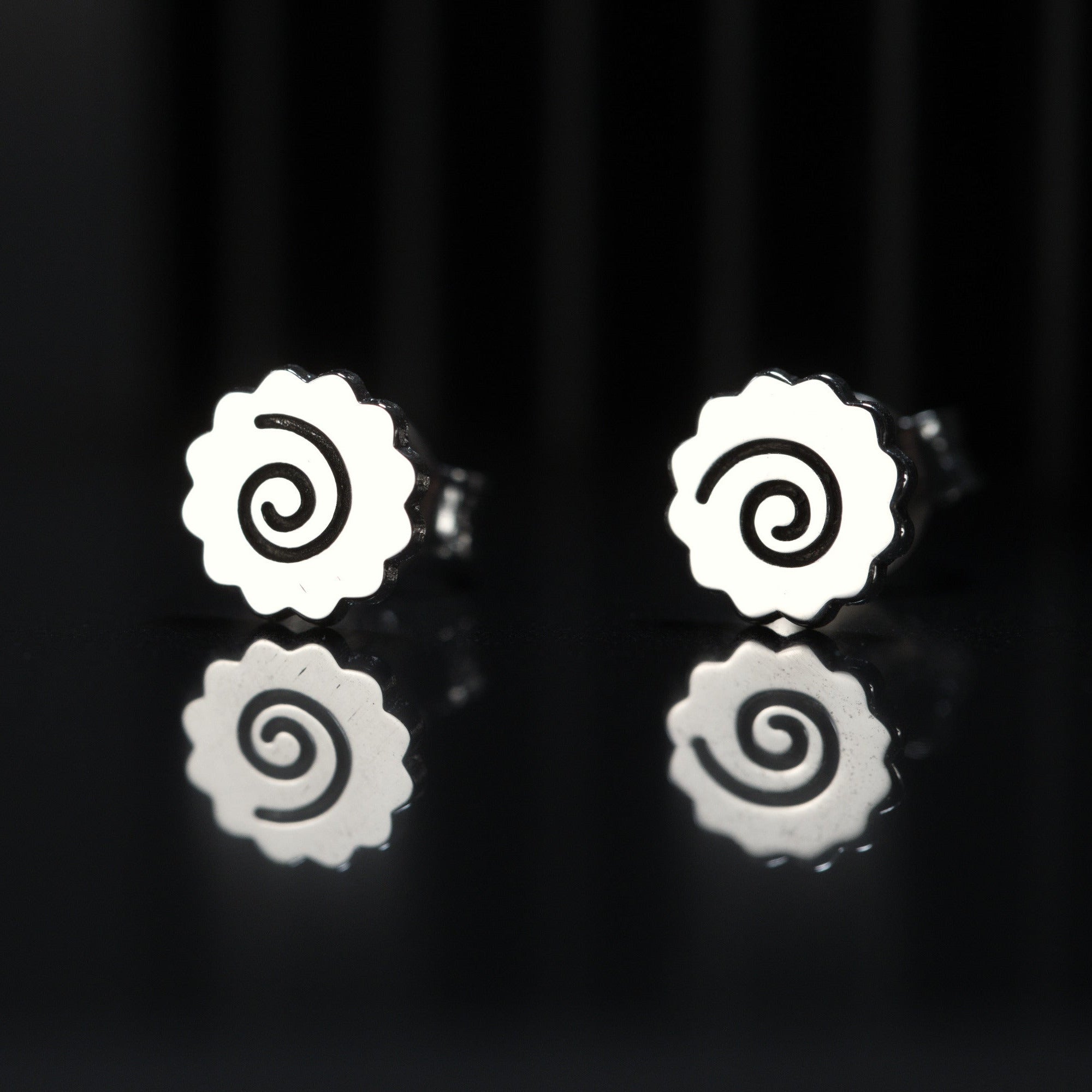 Ramen earrings in sterling silver with narutomaki spiral design