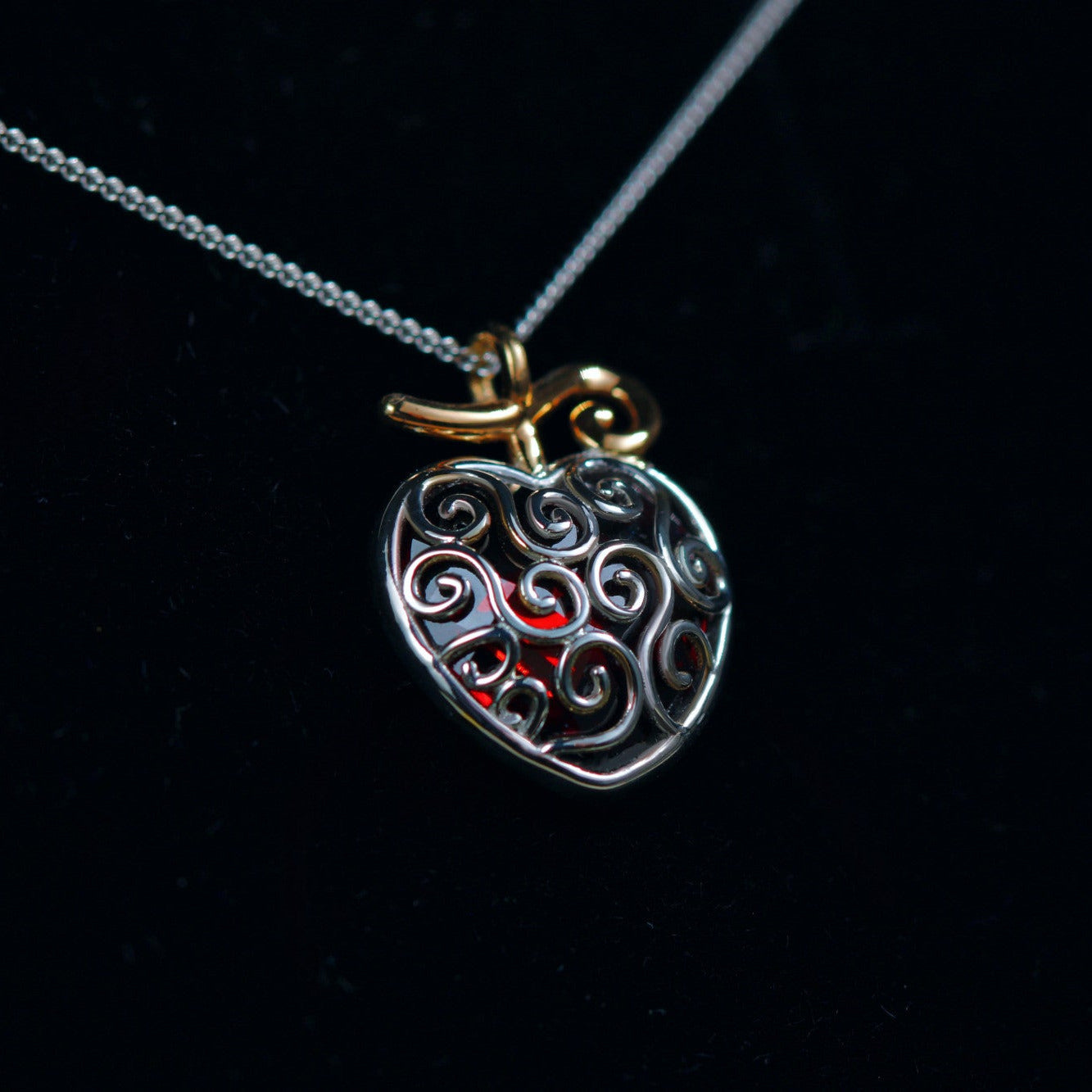 Detail of red heart cubic zirconia pendant