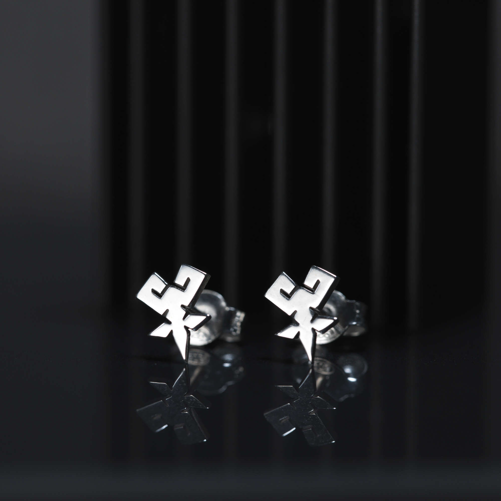Shihan stud earrings worn, showing subtle and elegant everyday design