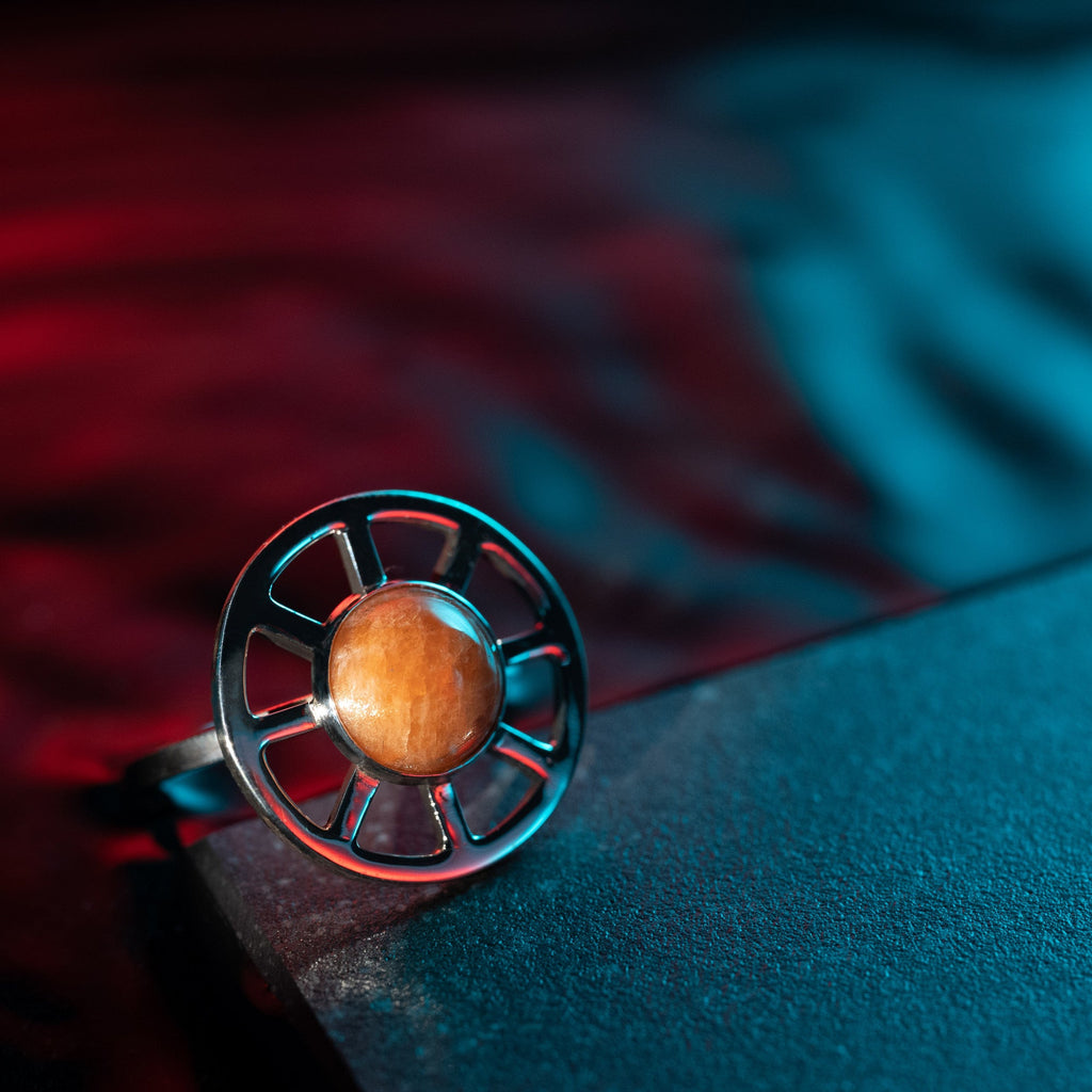 Taiyo ring worn, showing bold and luminous design