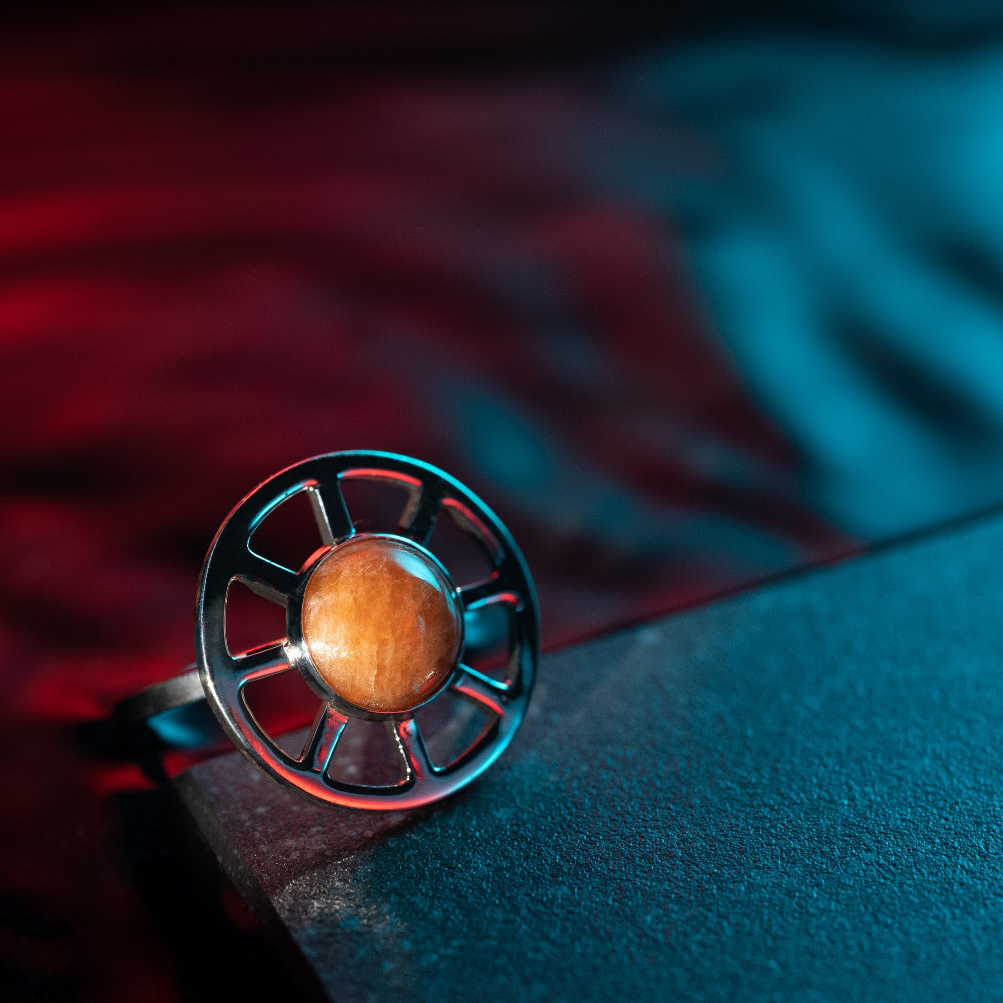 Taiyo ring worn, showing bold and luminous design