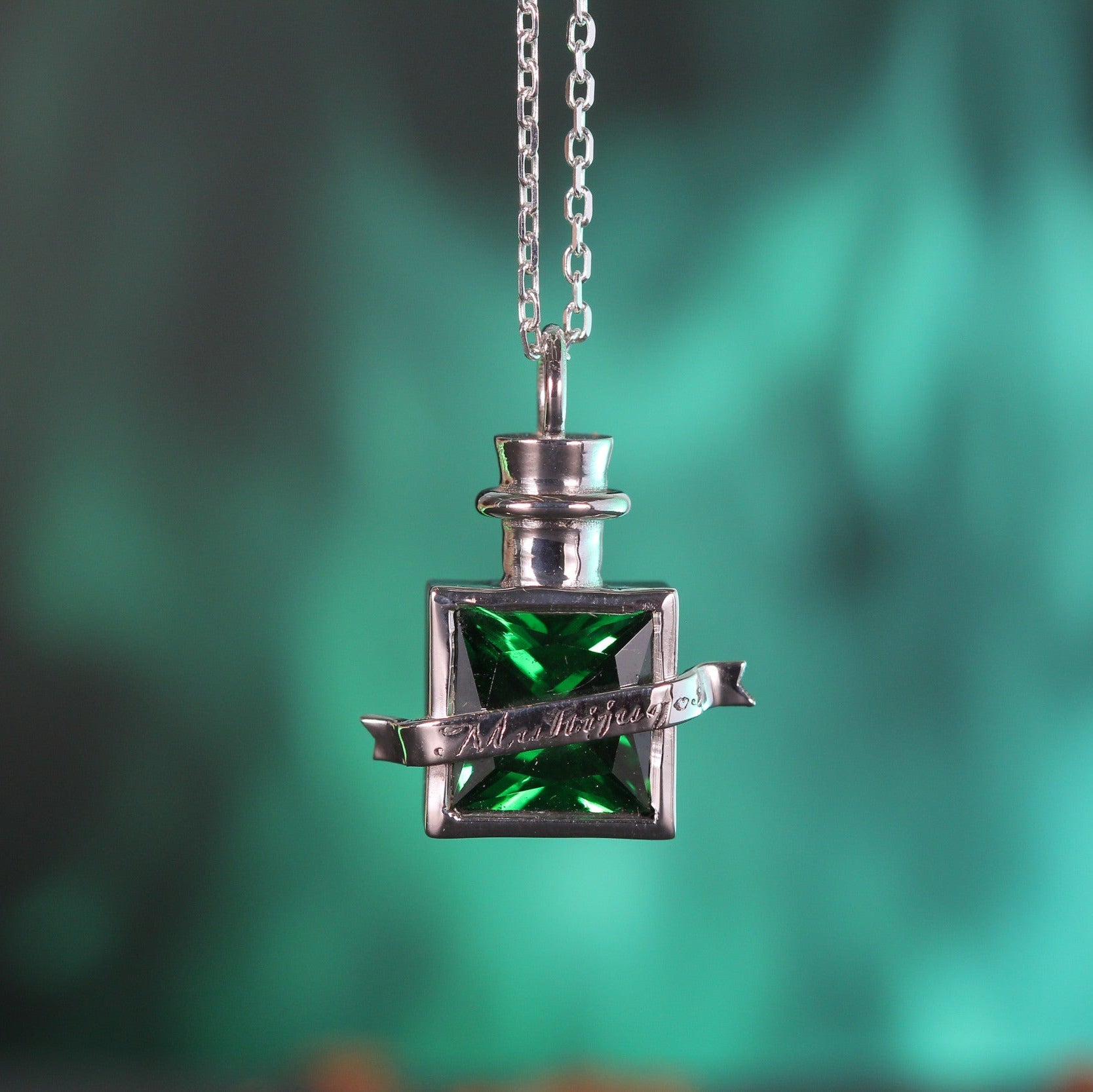 Full view of transformation elixir necklace in sterling silver