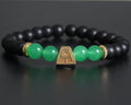 Tsuchi bracelet in sterling silver with gold plated earth symbol, black onyx and green agate beads