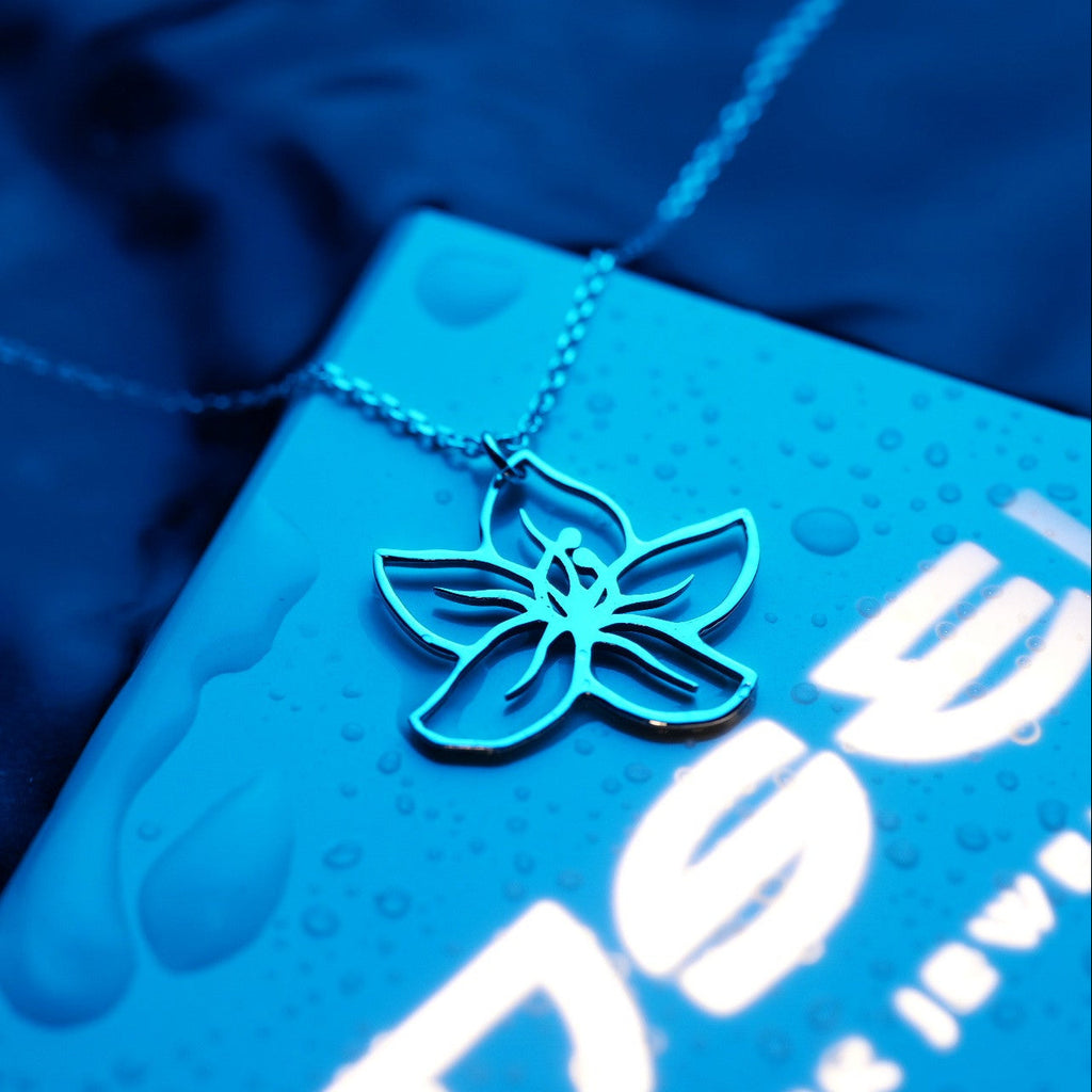 Detailed view of lunar flower pendant