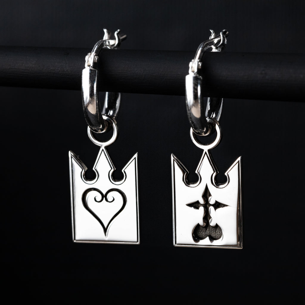 Unmei earrings in sterling silver with card design featuring heart and incorporeal symbol