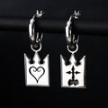 Unmei earrings in sterling silver with card design featuring heart and incorporeal symbol