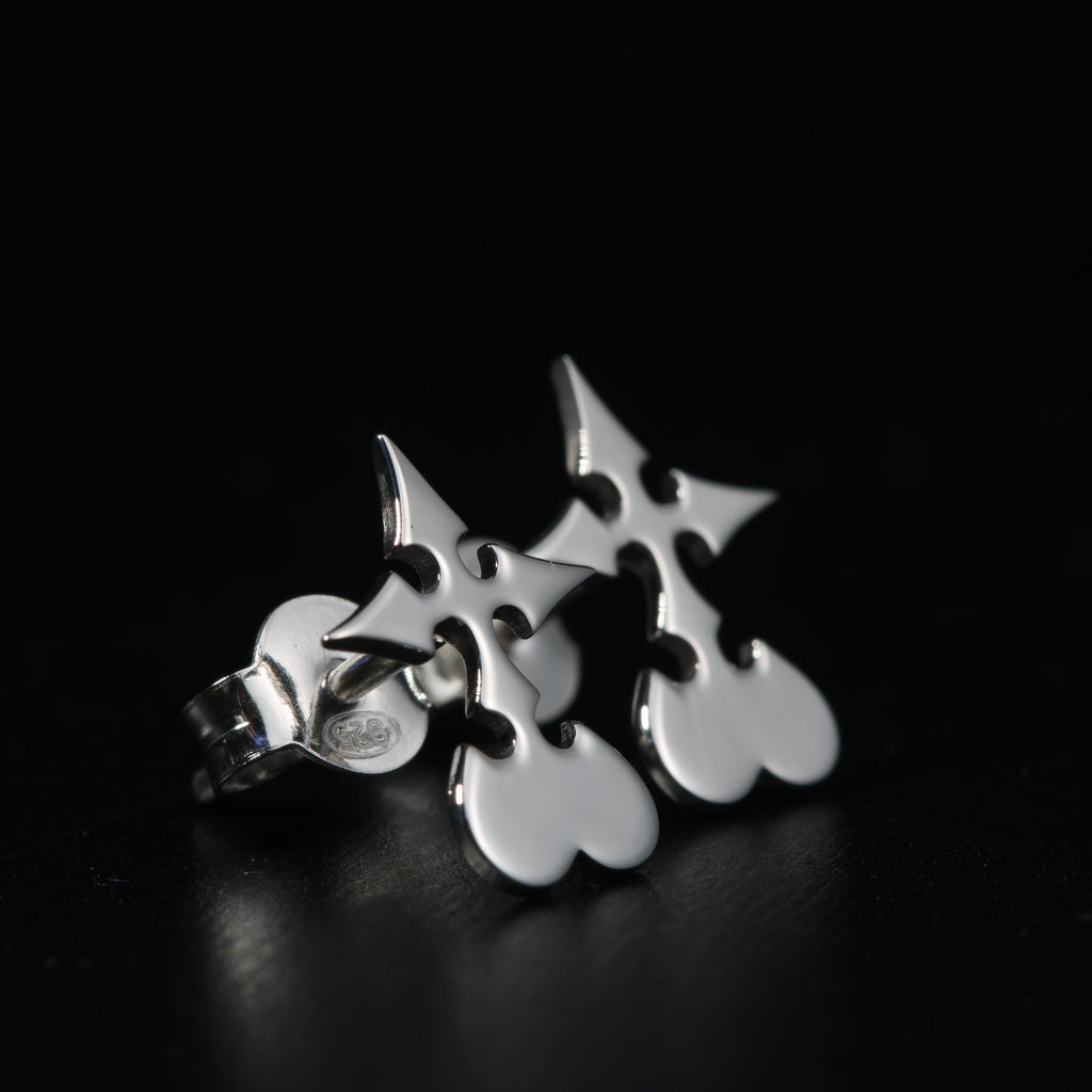 Detail of Utsuro stud earrings showing clean and precise sterling silver design