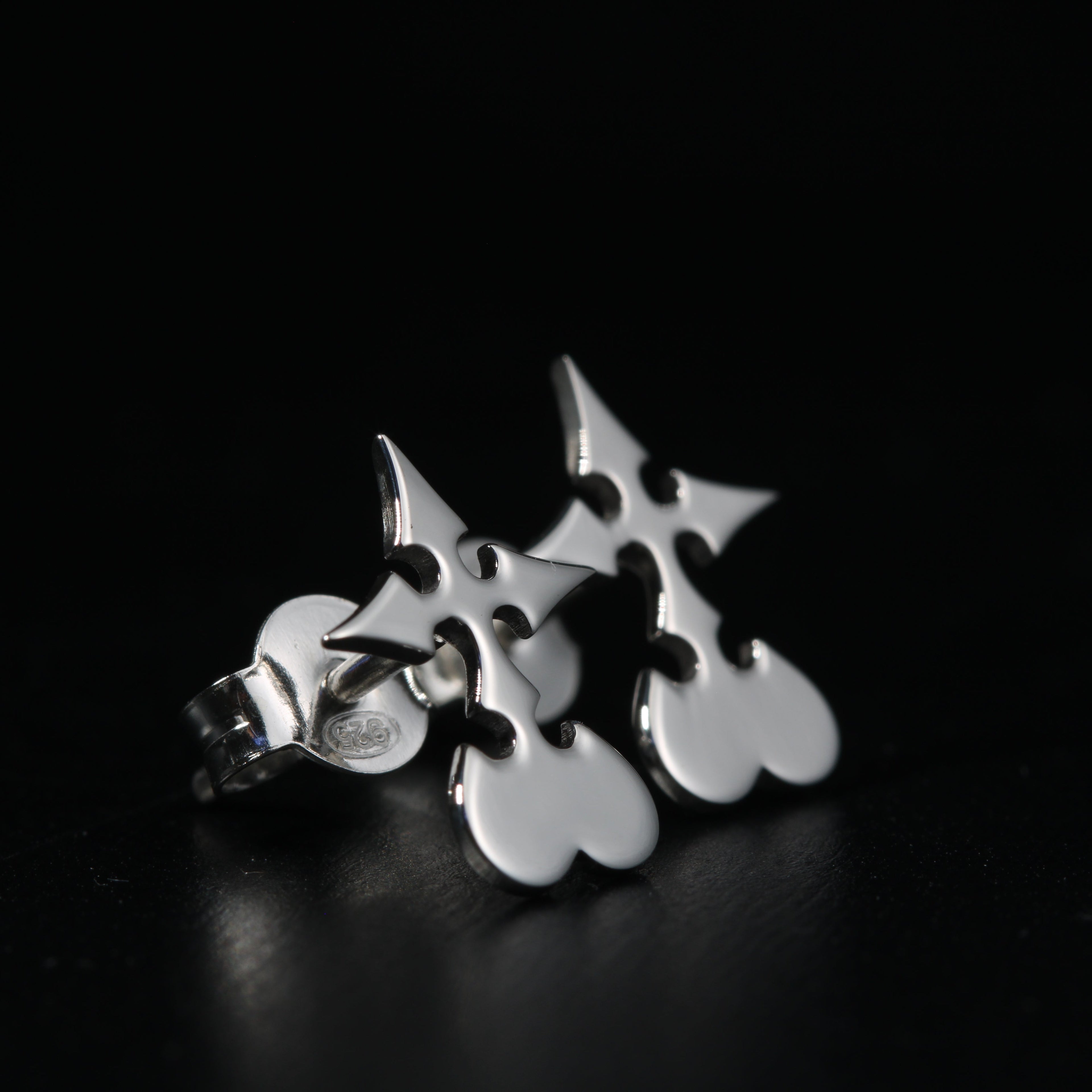 Detail of Utsuro stud earrings showing clean and precise sterling silver design