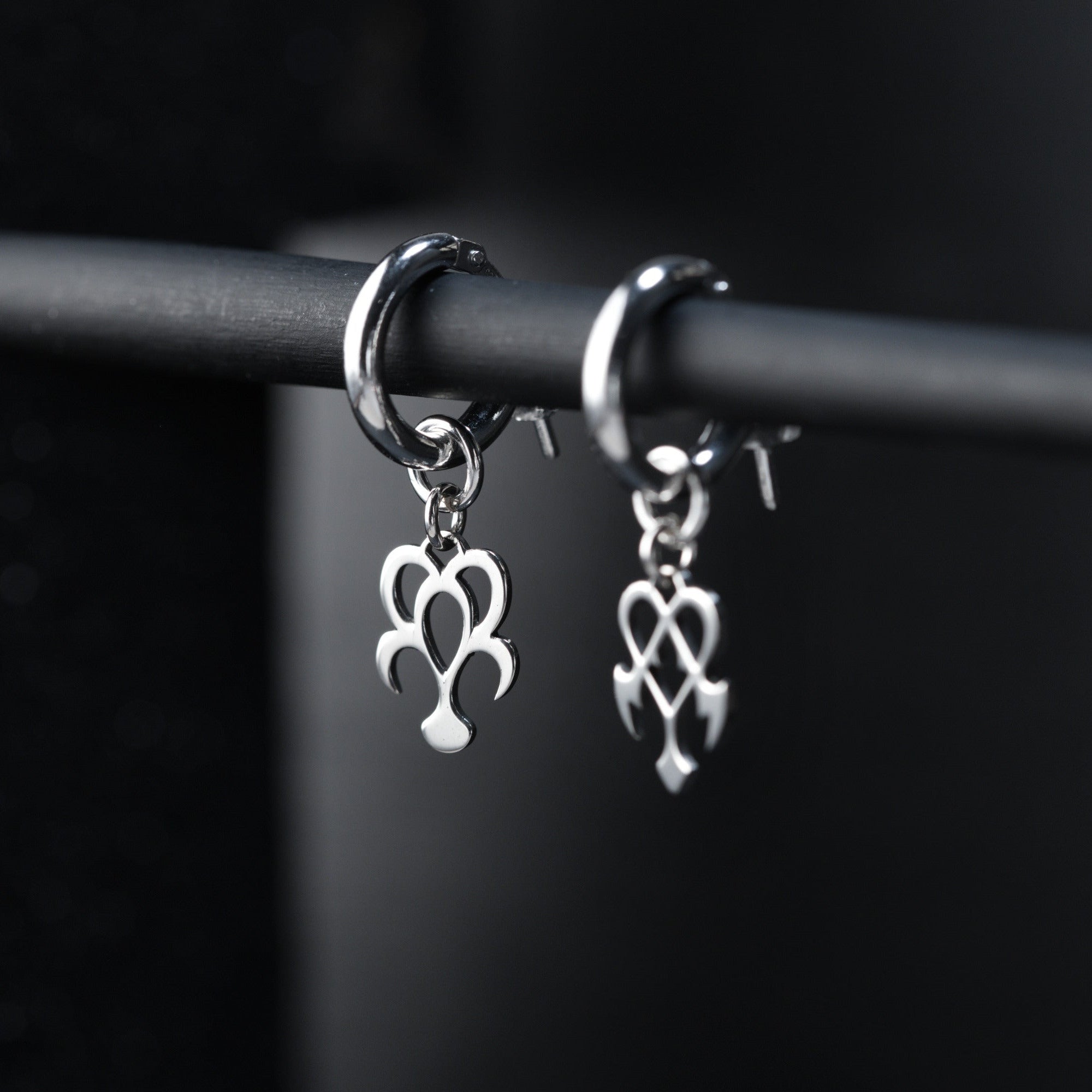 Yume hoop earrings worn, showing balanced and expressive dream and nightmare design